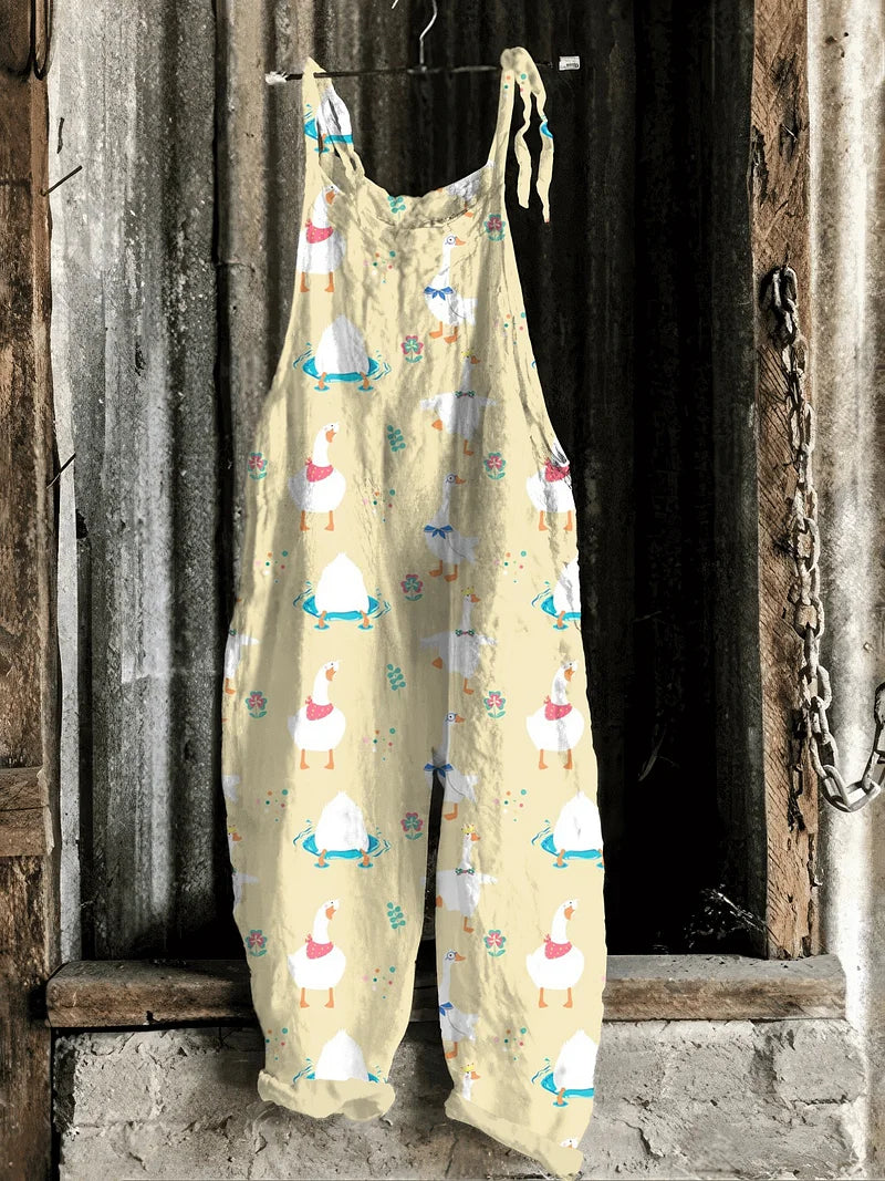Solea | Lightweight artisanal jumpsuit in beige with whimsical goose & crab print