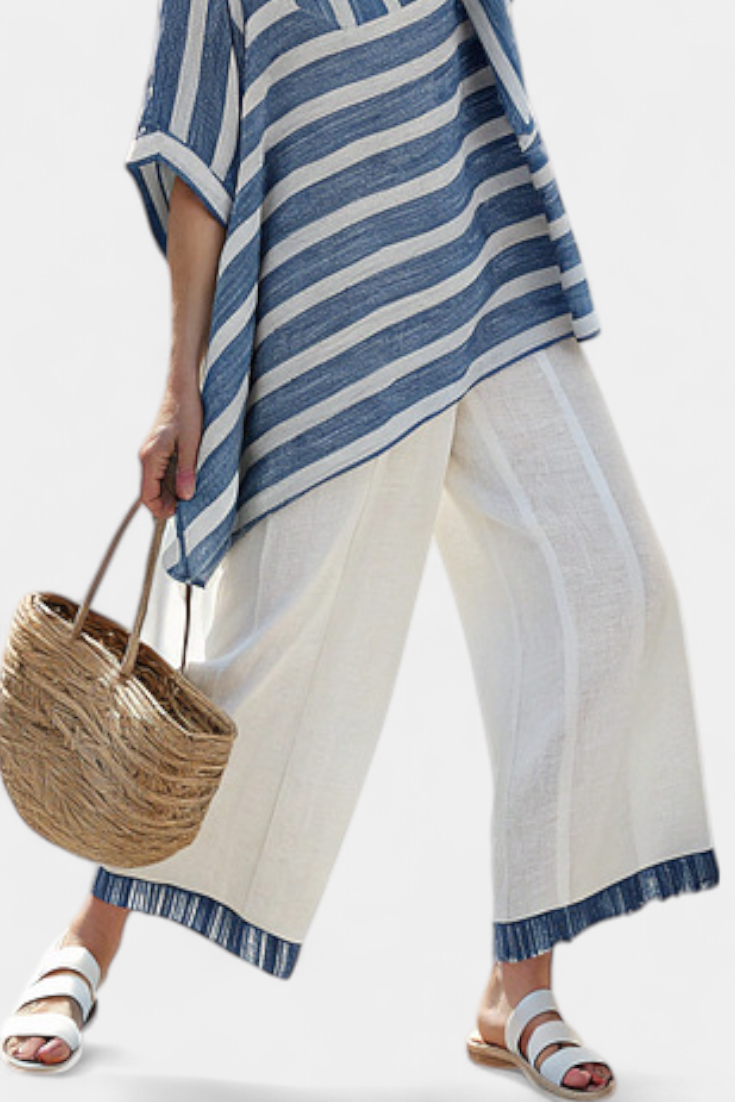 Elegant Mediterranean Linen Set with Blue Stripes and Cuffed Pants for a Fresh and Stylish Look