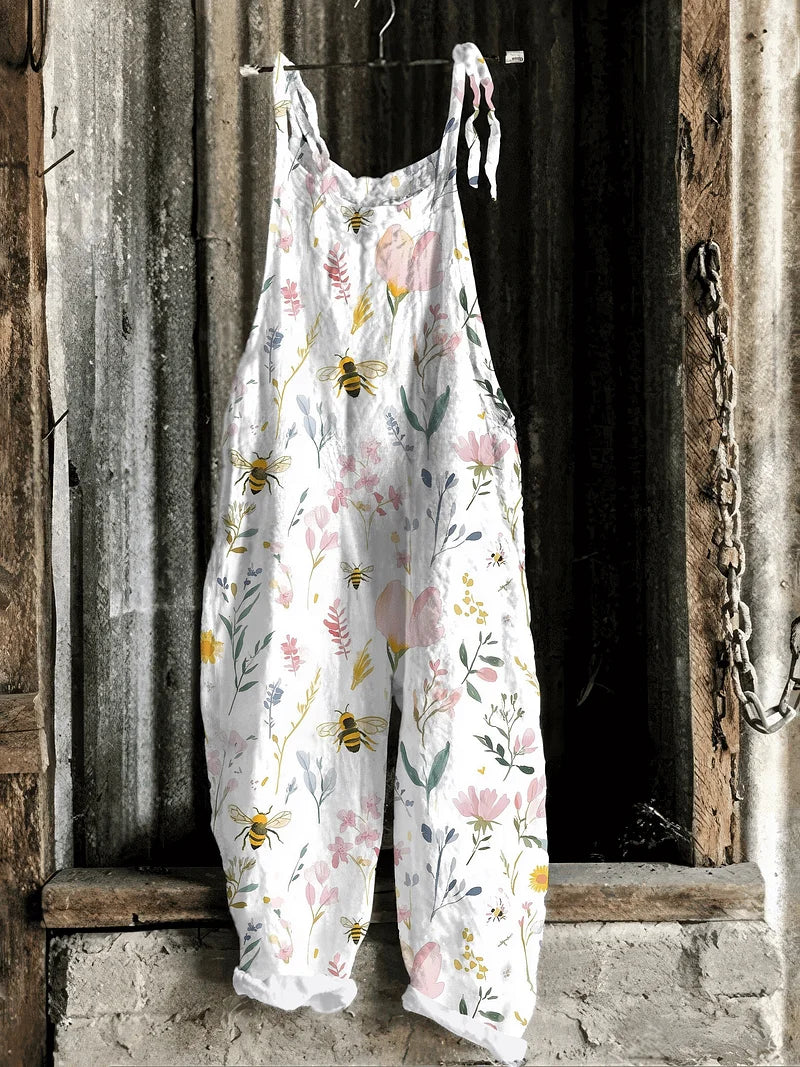 Solea | Lightweight artisanal jumpsuit in white bee & wildflower meadow print